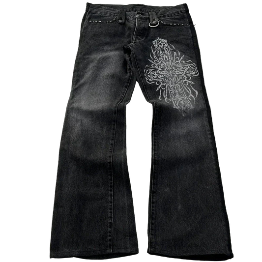 Washed denim jeans with decorative pockets